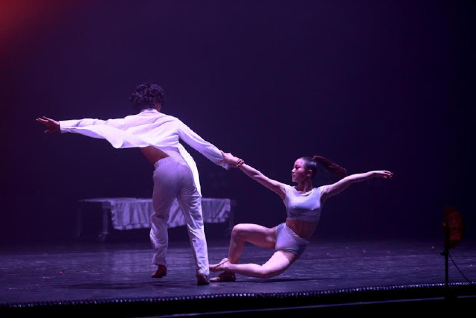 Two dancers perform a pas de deux during Life Element – O2, a modern ballet production staged in Ulaanbaatar, Mongolia, to call for action against air pollution. 