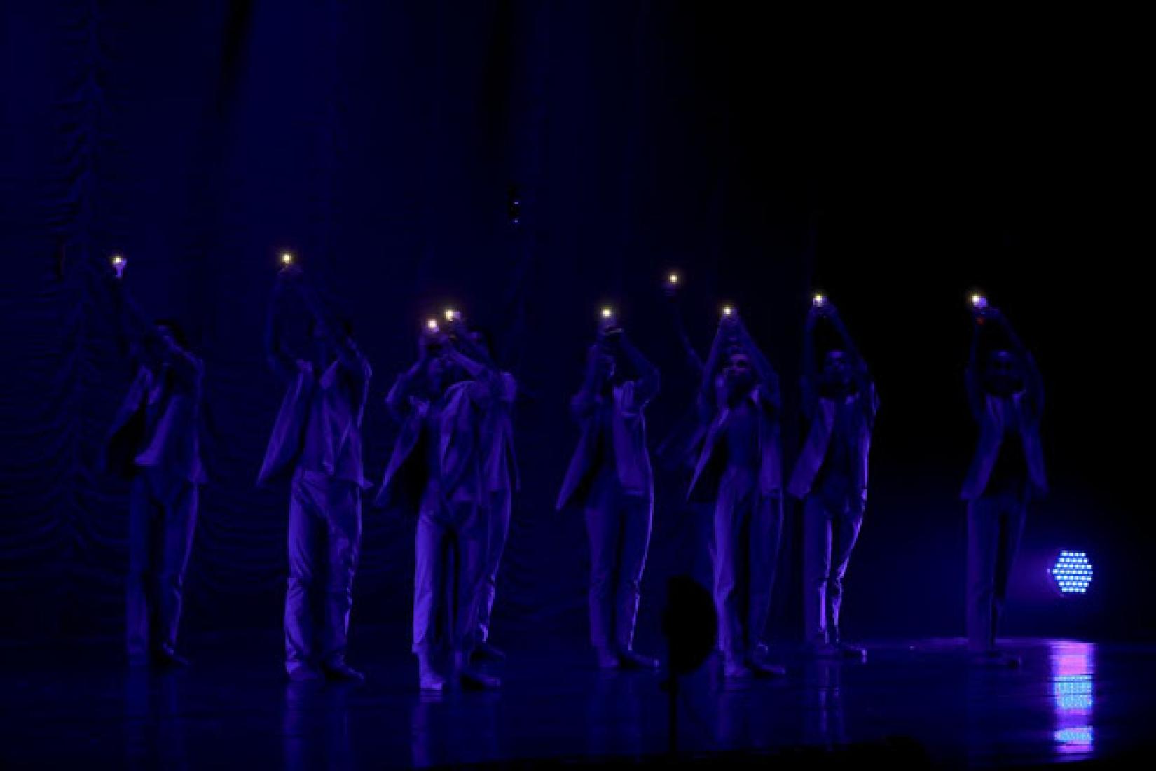  Dancers raise their phones as torch lights during Life Element – O2, a modern ballet production staged in Ulaanbaatar, Mongolia, to call for action against air pollution. 