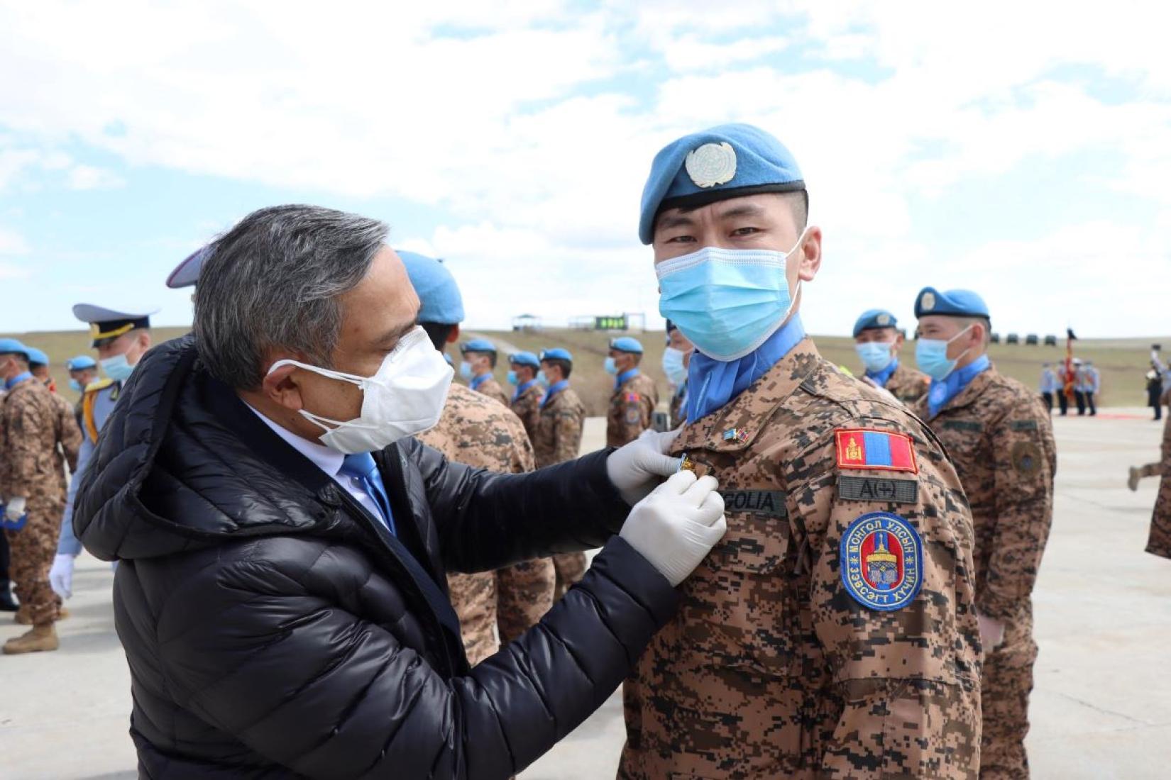 Mongolian Peacekeepers honoured at the centenary ceremony by the