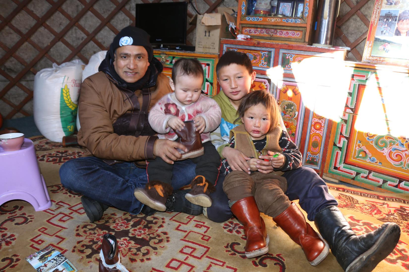 Tapan with herder children in Zavkhan